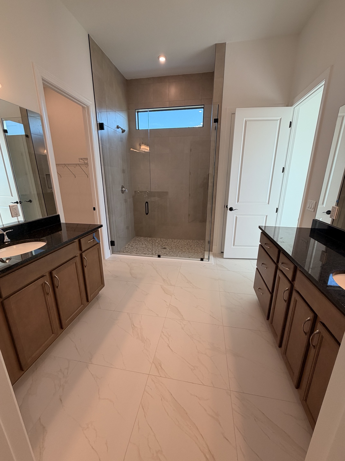 Completed custom bathroom remodel by Ric Tile and Marble