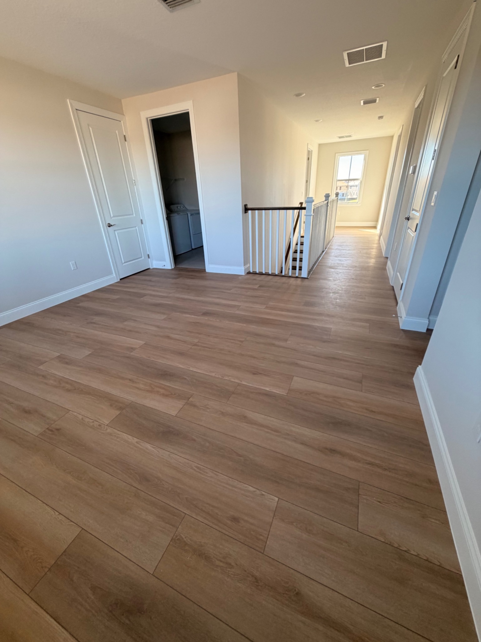 Completed wood-look vinyl flooring installation